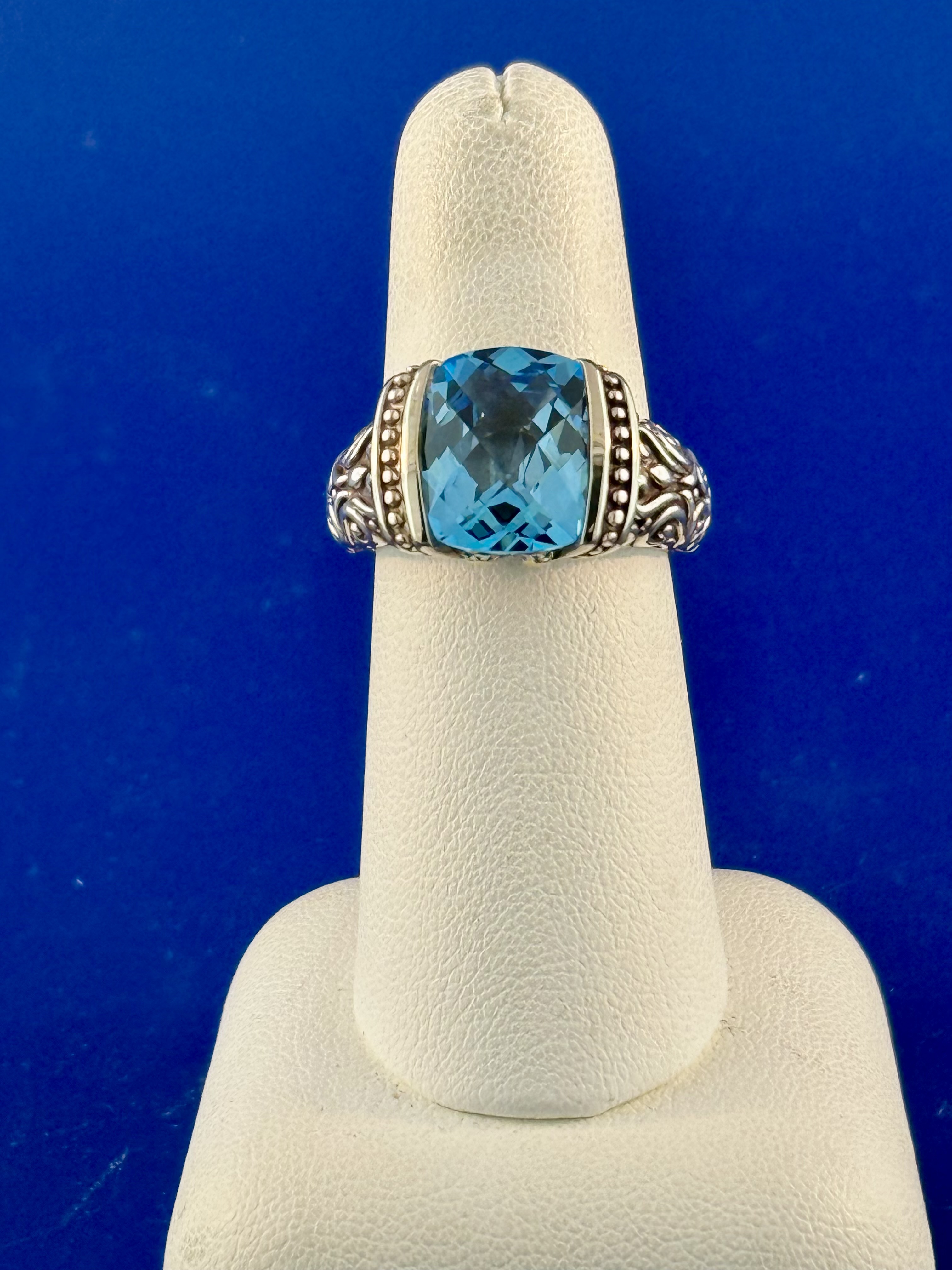 Sterling silver and 18 kt blue topaz ring