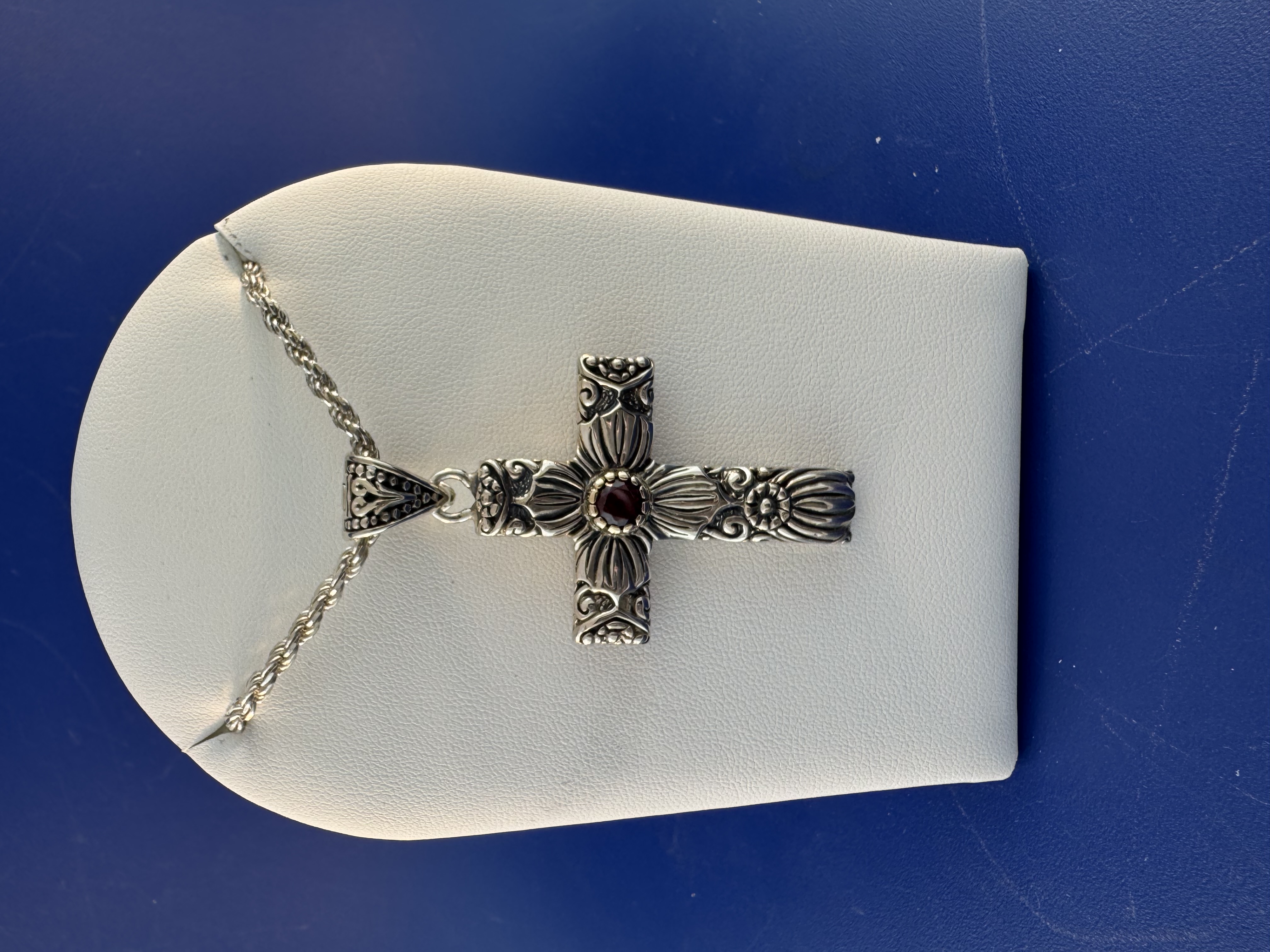 Sterling silver and 18 kt garnet cross